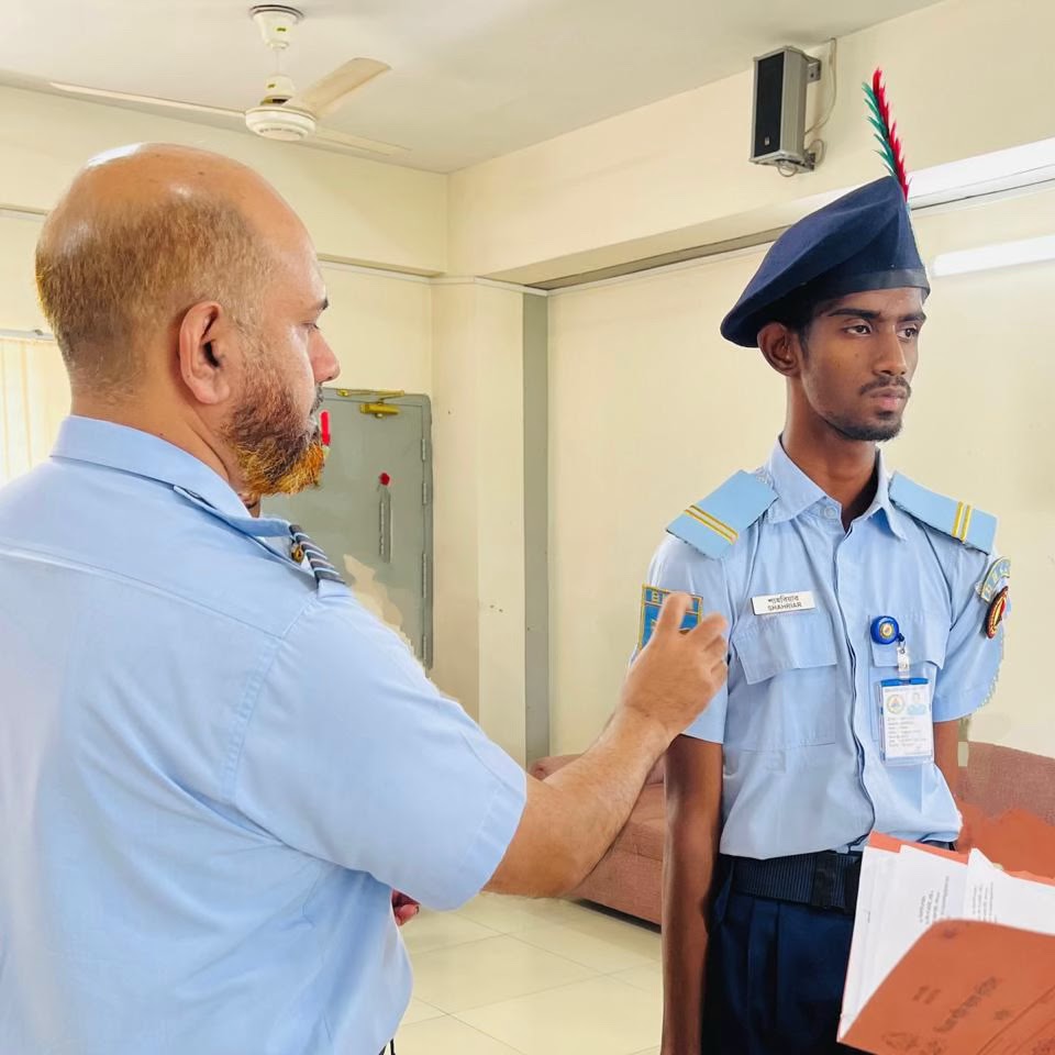 Shahriar Ahmed Receiving BNCC Cadet Corporal Rank from Wing Commander Shamim Ahmed